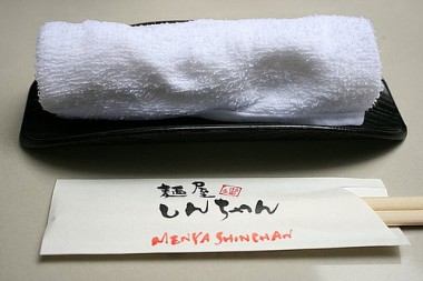 "Oshibori", warm hand towel, and disposable chopsticks: only wash your hands and don't rub those chopsticks together!