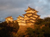 The sun setting on Himeji-jo Castle.